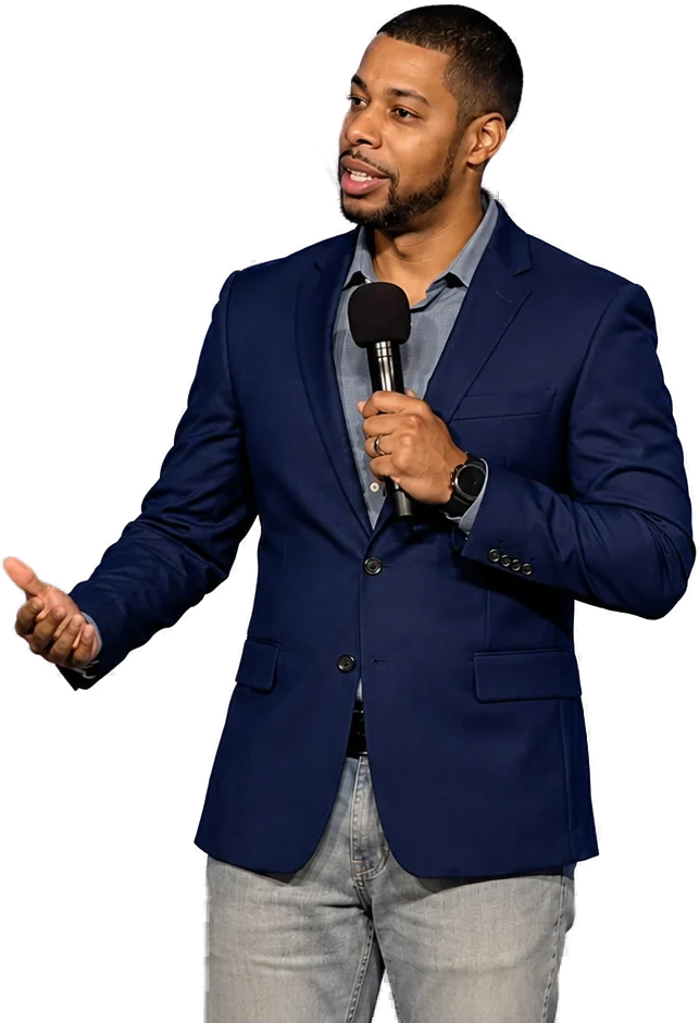 Ronald Buchanan Jr. speaking on stage with a microphone